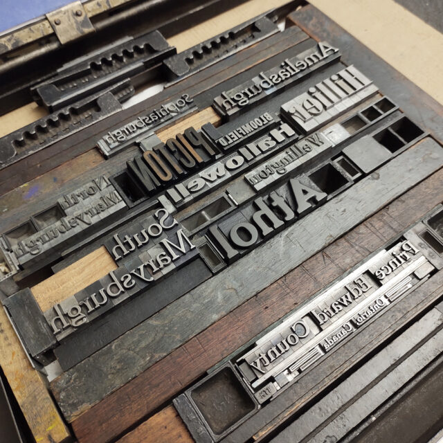 PEC Art Print Lock Up; wood and metal type ready for press