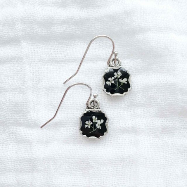 Handmade dainty pressed flower french hook drop earrings by Studio Chelsea.